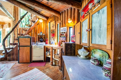 Dog-friendly, solar-powered cabin on 5 acres with woodstove, firepit & deck