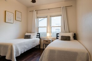 3 bedrooms, desk, iron/ironing board, travel cot