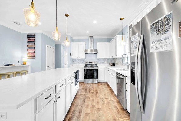 Classic & Elegant Stainless Steel Appliance Filled Kitchen, Large Granite Island