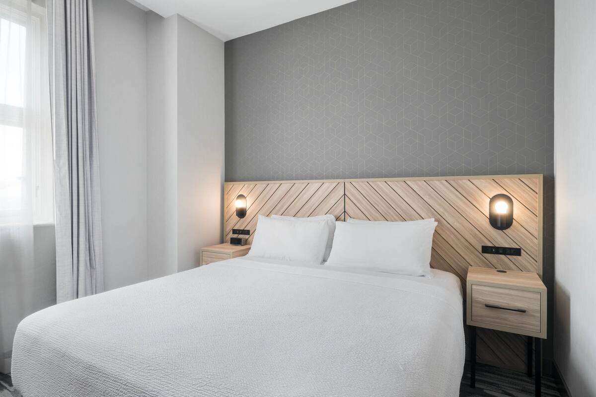 Standard Suite, 1 King Bed with Sofa bed | 1 bedroom, in-room safe, desk, laptop workspace