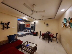 Habitación cuádruple familiar | Ropa de cama de alta calidad y colchones Select Comfort