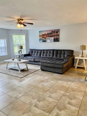 Apartment, Multiple Beds, Pool Access | Living room | 50-inch flat-screen TV with cable channels, TV - Three Bedroom Apartment #2 -- 5009 LBC -- Vusa Three Bedroom Condo Apartment (Kissimmee)