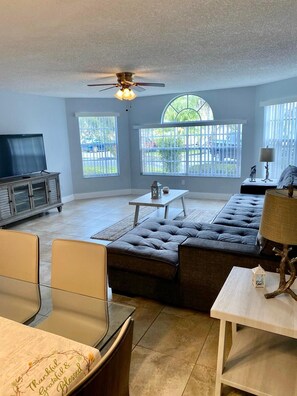 Apartment, Multiple Beds, Pool Access | Living room | 50-inch flat-screen TV with cable channels, TV - Three Bedroom Apartment #2 -- 5009 LBC -- Vusa Three Bedroom Condo Apartment (Kissimmee)