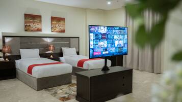 Executive Double Room | Desk, laptop workspace, blackout drapes, iron/ironing board