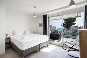 2 slaapkamers, een strijkplank/strijkijzer, reisbedje, gratis wifi