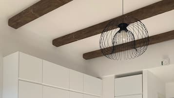Apartamento família | Cozinha privada | Geladeira grande, micro-ondas, fogão, cooktop