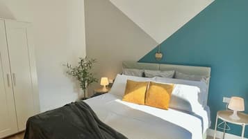 Family Apartment | Down duvets, desk, laptop workspace, blackout curtains