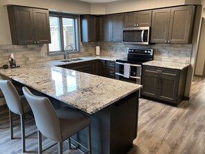 Fridge, microwave, oven, stovetop - 7 Bedroom Country Lodge Close to Town - Rooster Roost Ranch Lodge (Mitchell)