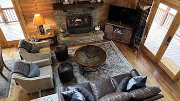 Smart TV, fireplace, books