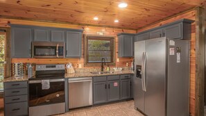 Fridge, microwave, oven, stovetop - Perfect for Large Families • 5BR Gatlinburg Cabin w/ Game Room, Theater & HotTub (Gatlinburg)
