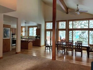 Enjoy meals in the central dining area with a view of the outdoors.