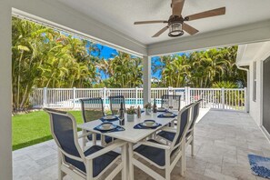 Outdoor dining - Endless Summer: Sparkling Pool, 2 Blocks to Beach, Fenced Yard by Anna Maria Life Vacation Rentals (Holmes Beach)