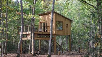 Cabaña de lujo | Minibar, cortinas opacas, ropa de cama