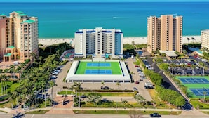 Exterior - Beachfront Living at the Apollo I On-Site Sunset Grille Tiki/Restaurant (Marco Island)