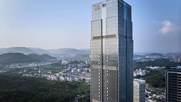 Standing tall in the city, this sleek skyscraper offers a unique perspective on urban living.