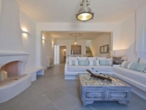 Smart TV, fireplace, DVD player, books