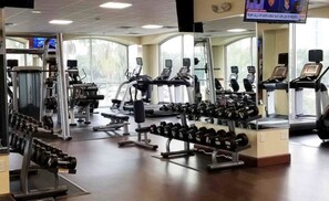 Stay fit on the go with our well-equipped gym featuring treadmills, elliptical machines, and weight benches.