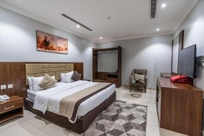 Standard Room | 1 bedroom, premium bedding, pillow-top beds, minibar - Al Muteb Suites Al Falah 3 (Riyadh)