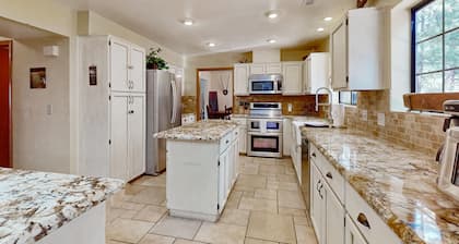 Lavish retreat with game room, tranquil porch & scenic yard-near skiing & dining