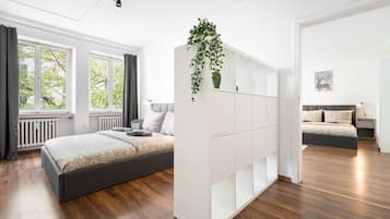 3 habitaciones, tabla de planchar con plancha, wifi y ropa de cama