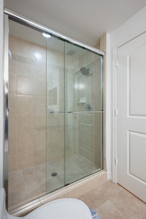 Shower, hair dryer, towels, soap