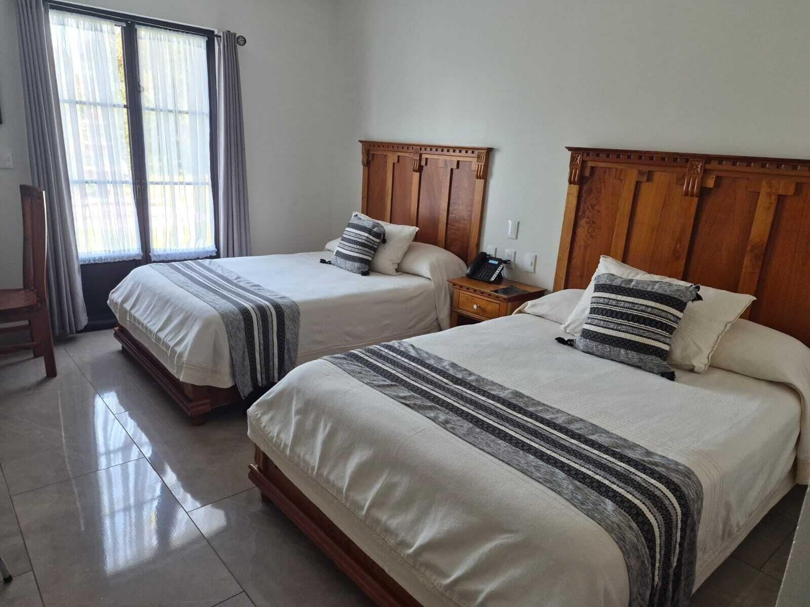 Standard dubbelrum | Sängtillbehör av högsta kvalitet, duntäcken och individuell inredning