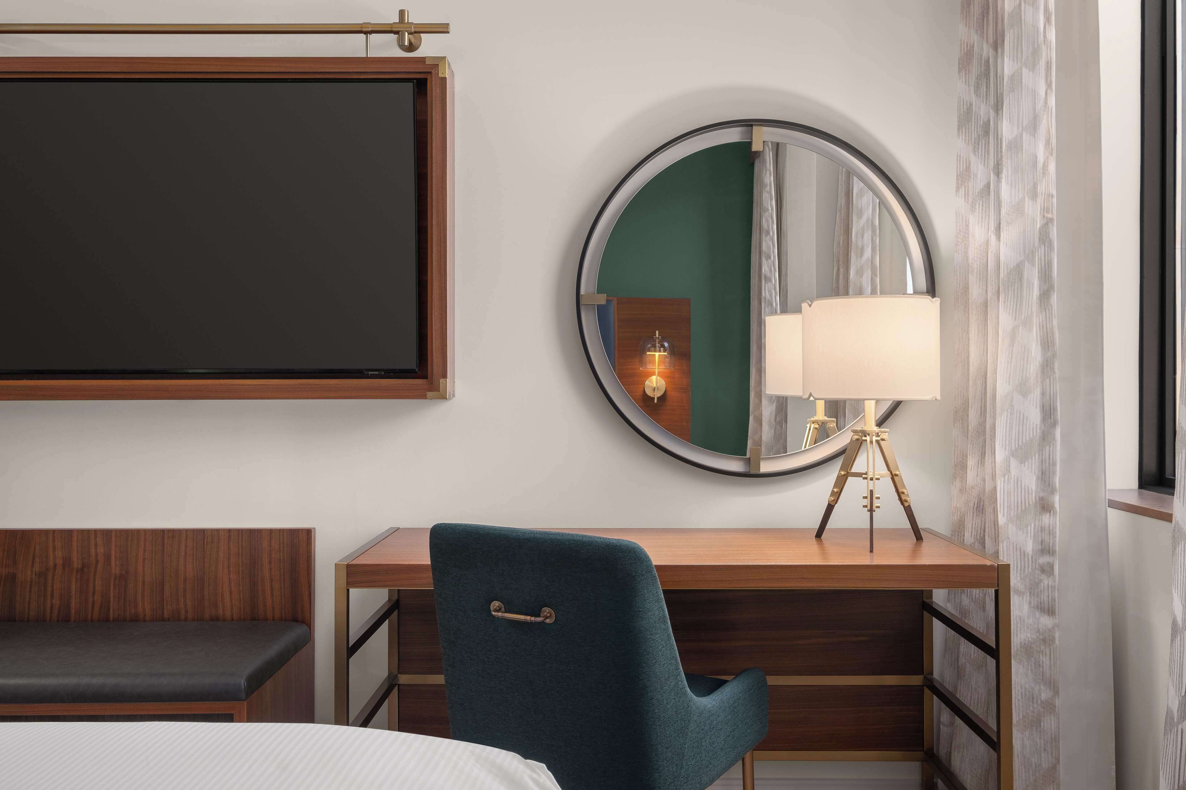Premium bedding, down comforters, in-room safe, desk