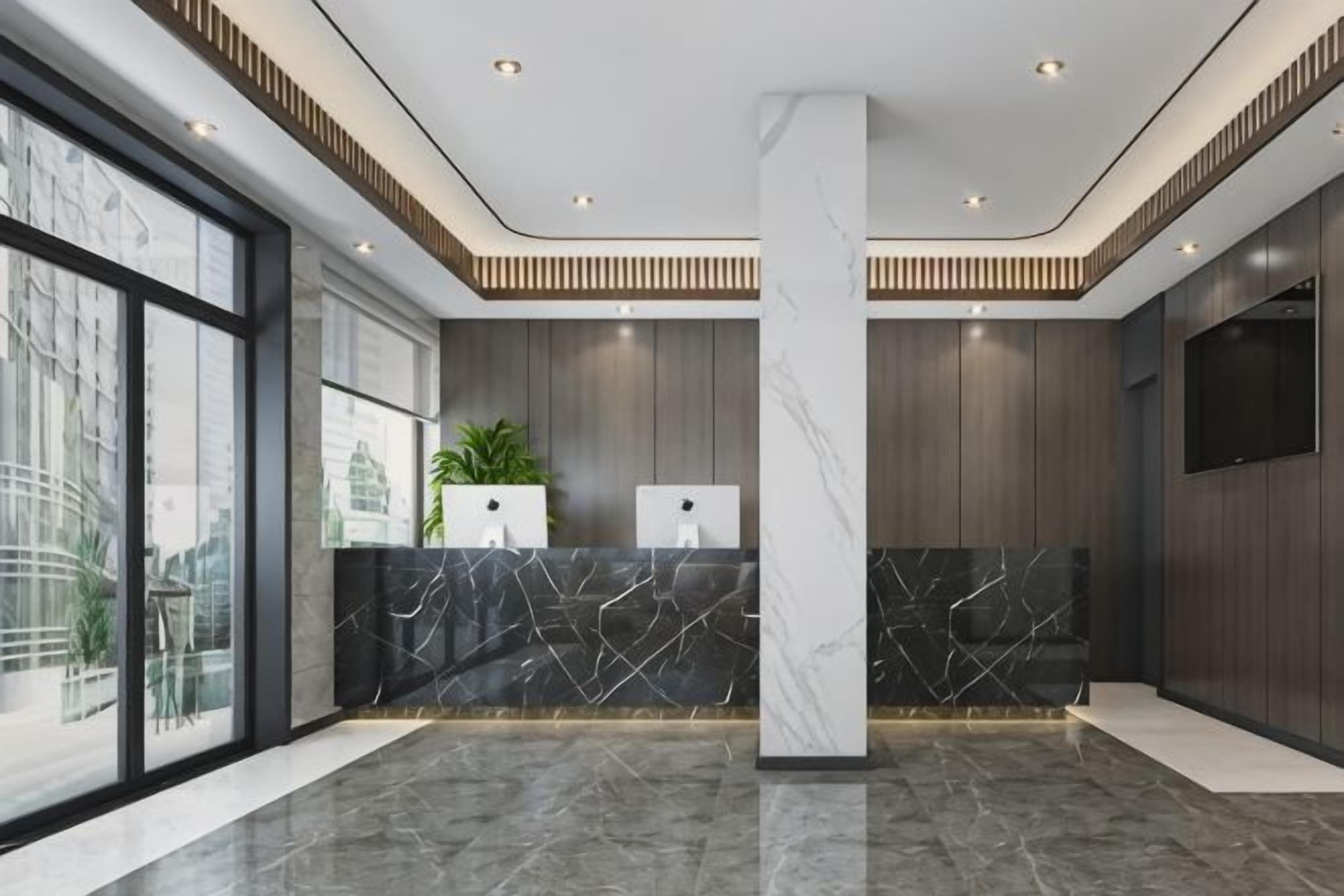 A modern reception area with a marble counter, large windows, and a central pillar.