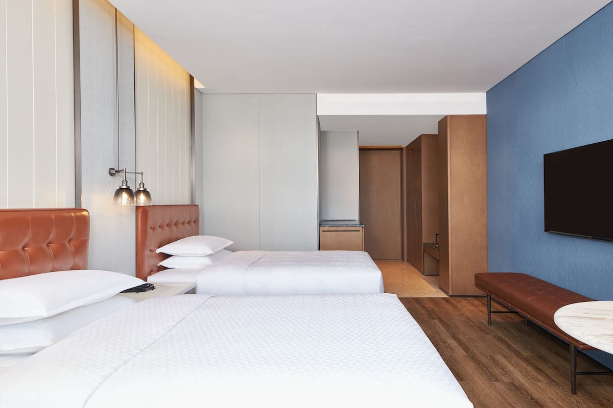 Premium bedding, down comforters, pillowtop beds, desk