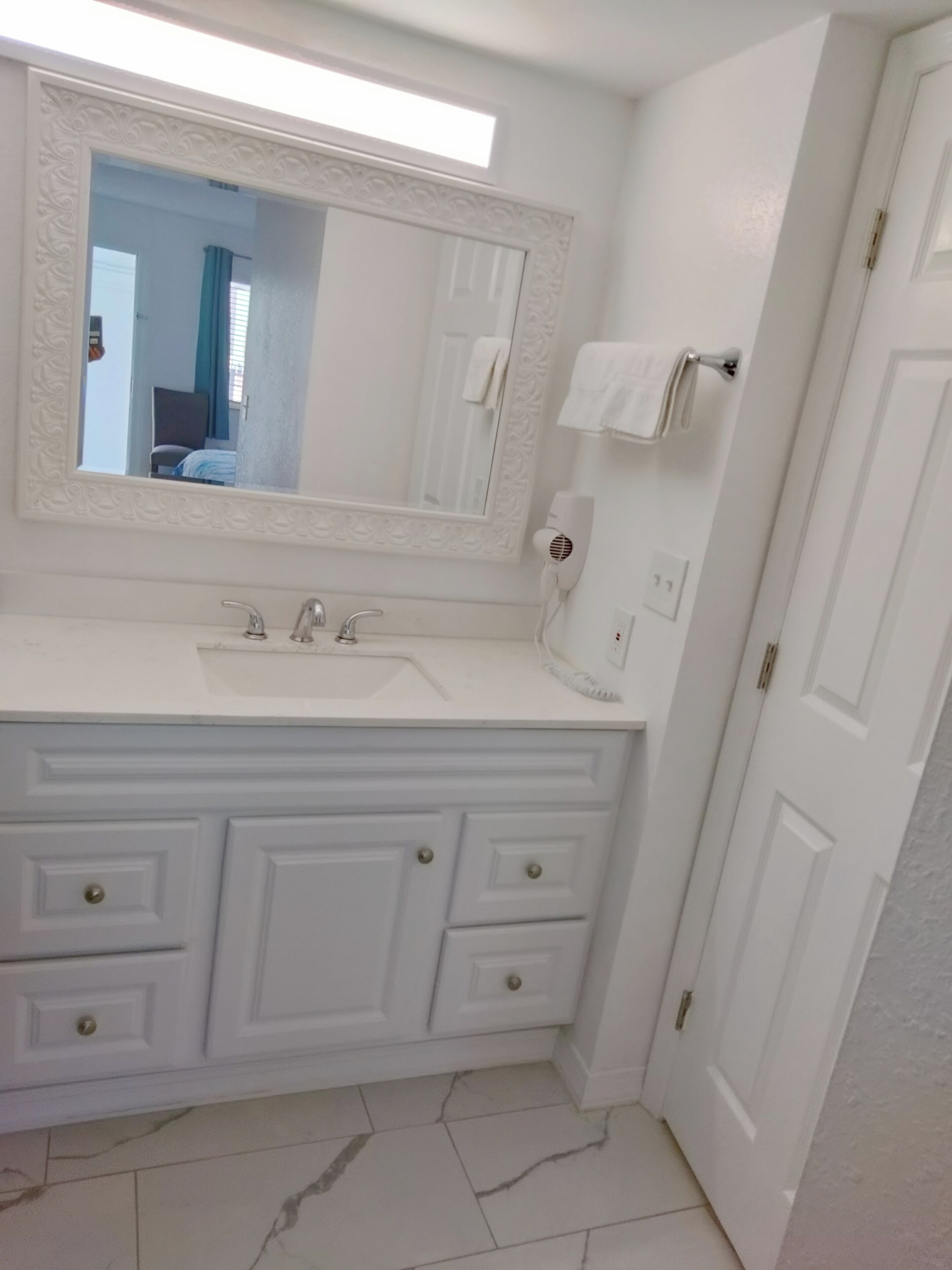 hair dryer, towels, soap, shampoo