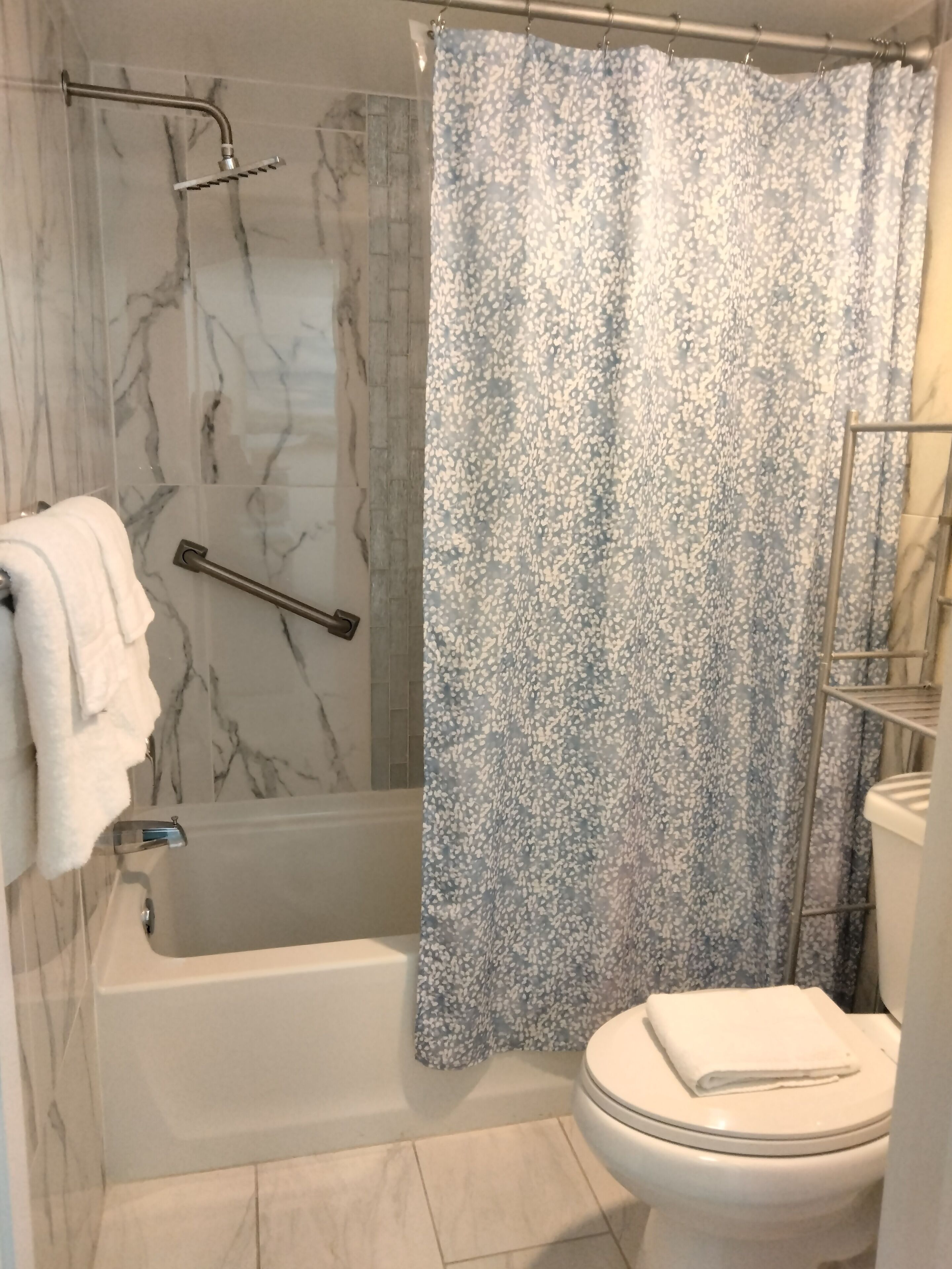 hair dryer, towels, soap, shampoo