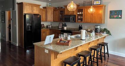 Stay in the heart of historic Jacksonville at Selah House. Walk to Britt Festival, restaurants, wine tasting, shops, and downtown in minutes. Features luxury Saatva mattresses, a spa-like primary suite, garage parking, and a covered balcony.