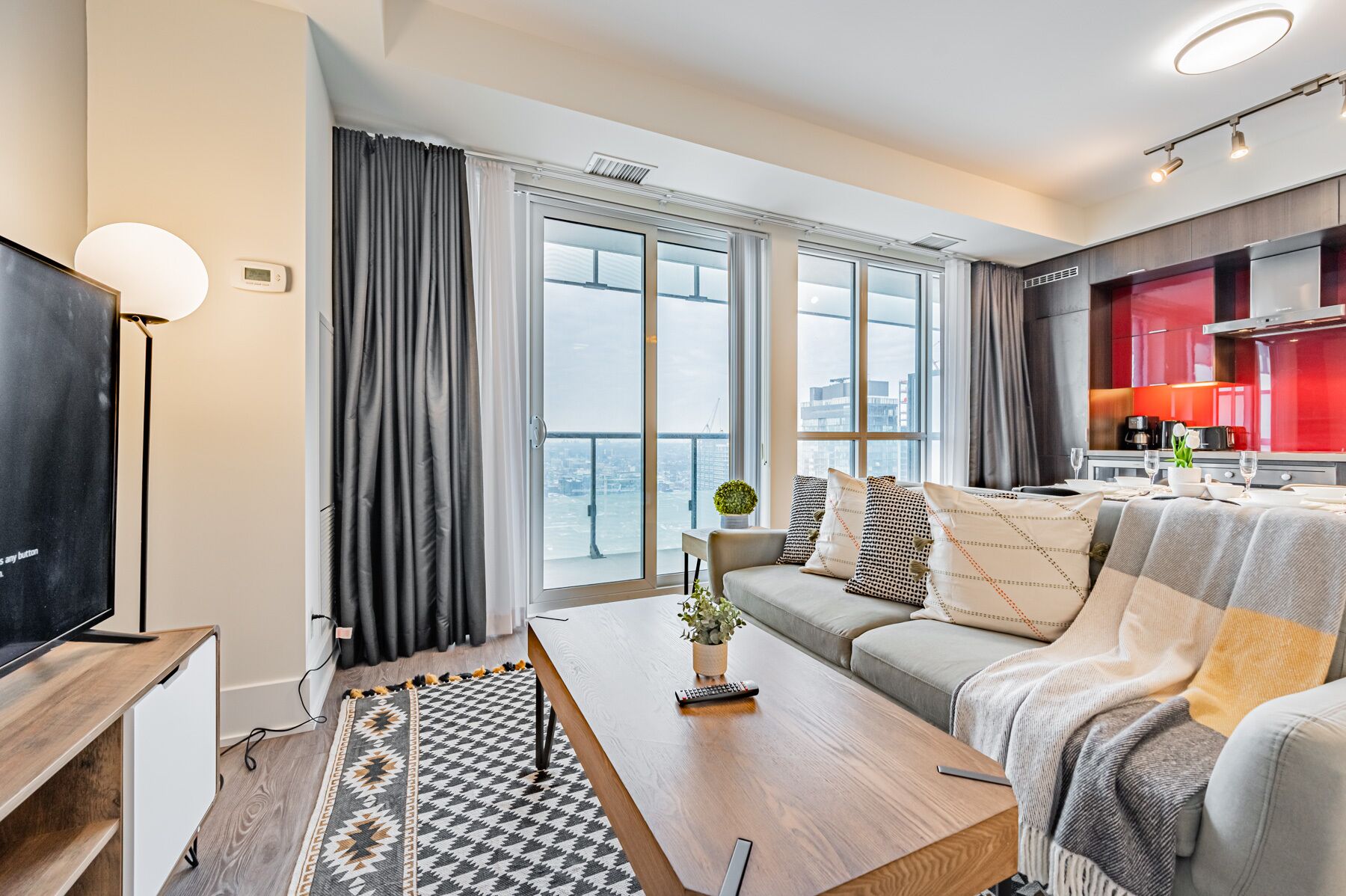 Signature Condo, 1 Bedroom, Balcony, Lake View | Living area | 50-inch Smart TV with satellite channels, TV, Netflix