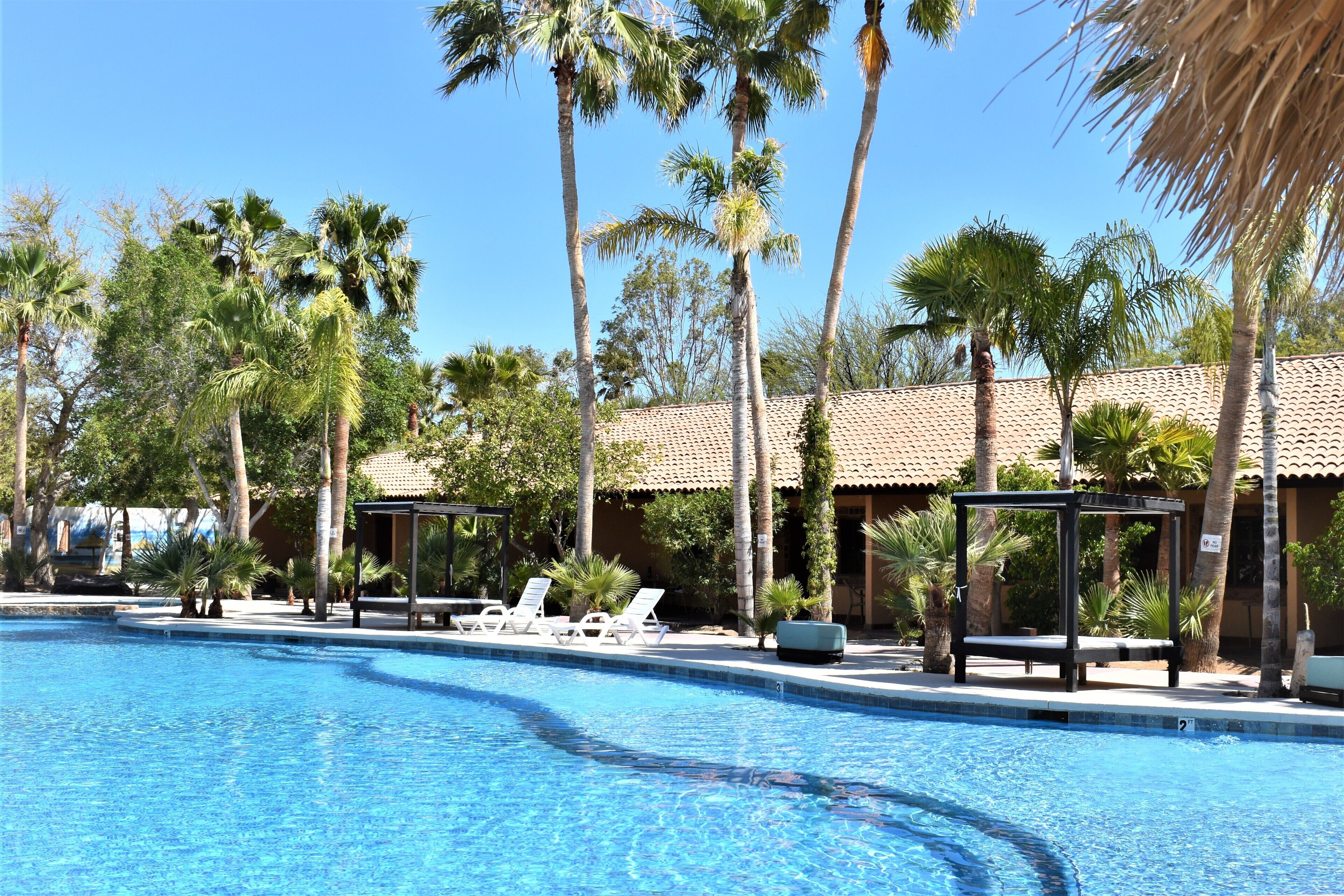 2 outdoor pools, open 7:00 am to 9:00 am, free pool cabanas