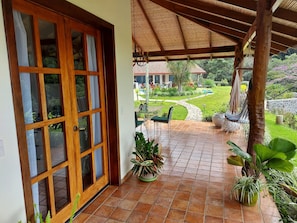 Superior Bungalow | Living area | 30-inch flat-screen TV with cable channels, TV - BUNGALOWS SANLAZ (Jesús)