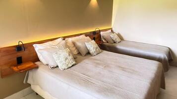 Chambre Triple Confort | Minibar, bureau, fer et planche Ă repasser, Wi-Fi gratuit