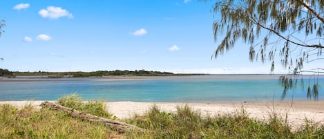 On the beach, sun-loungers, beach towels