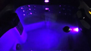 A hot tub with purple lighting. - Cute little costal cabin.  One mile from Lake Tenkiller.  Private Spa/Hot Tub  (Cookson)