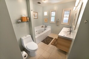 Shower, jetted tub, hair dryer, bidet