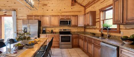 House (6 Bedrooms) | Private kitchen | Fridge, microwave, oven, stovetop