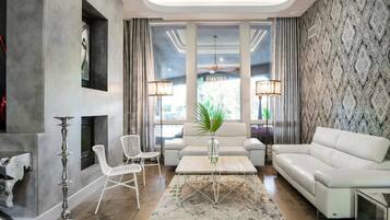 55-inch TV with digital channels, fireplace, streaming services