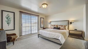 A bedroom with a large bed, a desk, a chair, and a window with blinds. - Resort Plaza #5065 by Avantstay Ski-in/ski-out Condo in Park City Mountain Resort (Park City)