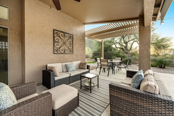 Outdoor dining - Stunning home with mountain views, pool, fast WiFi, central AC & W/D (Mesa)