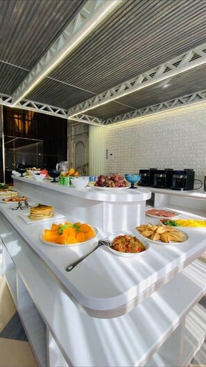 Daily buffet breakfast (USD 10 per person)