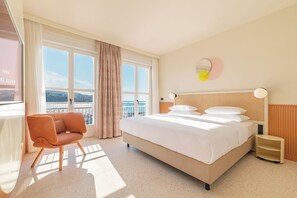 Suite ejecutiva | Ropa de cama de alta calidad, minibar, caja fuerte y escritorio