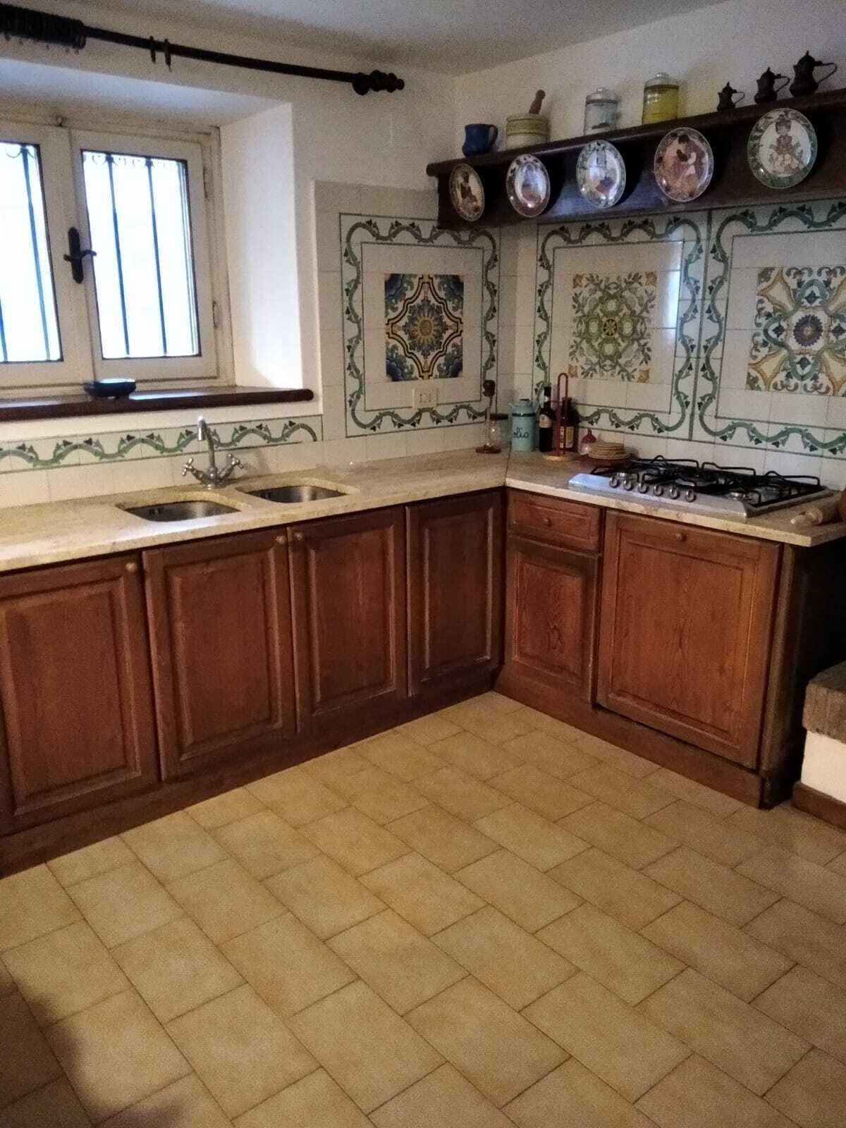 Fridge, stovetop, cookware/dishes/utensils, dining tables