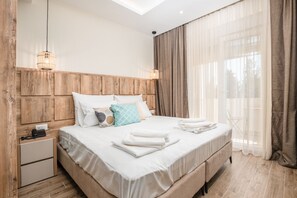 华丽双人房或双床房 | 客房内保险箱、遮光窗帘、免费 WiFi、床单