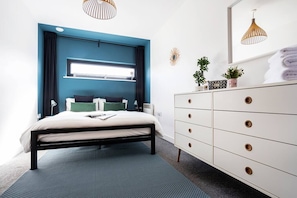 2 bedrooms, blackout curtains, iron/ironing board, free Internet
