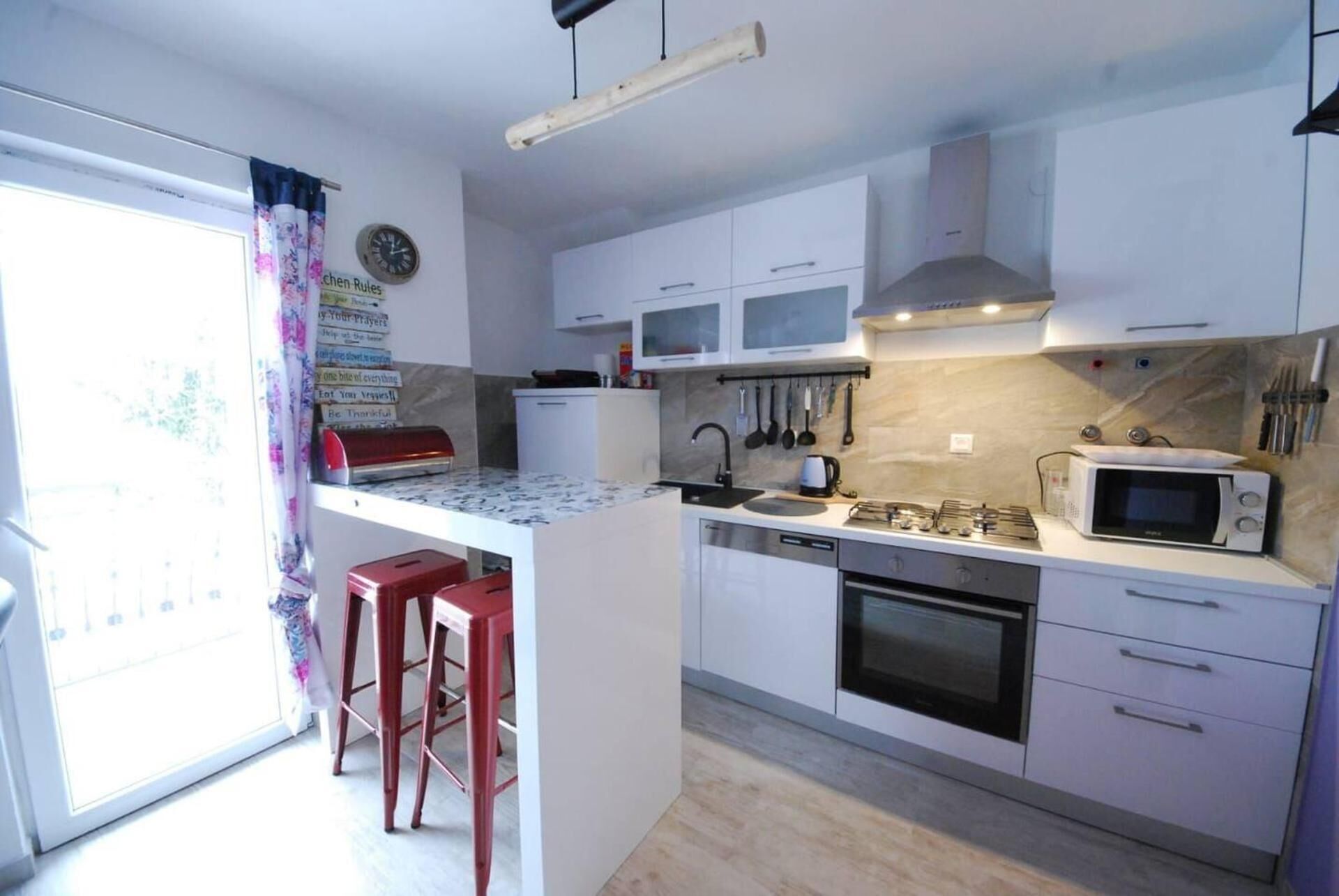 Villa | Private kitchen | Fridge, microwave, oven, stovetop