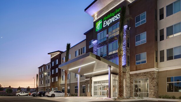 A Holiday Inn Express building with a covered entrance, multiple floors, and a parking lot. - Holiday Inn Express & Suites Ontario - Chino Hills by IHG (Chino Hills)